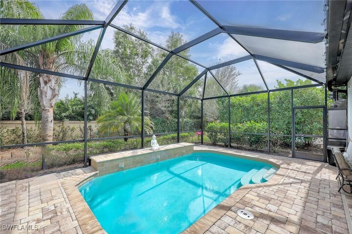 Property Photo: 7670 Jacaranda Lane FL 34114