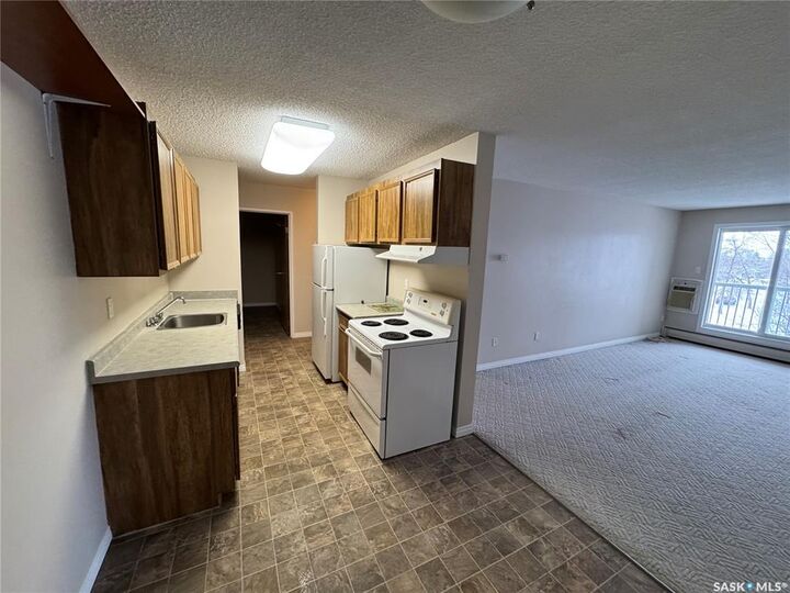 Property Photo:  1808 Eaglesham Avenue 306  SK S4H 3A8 