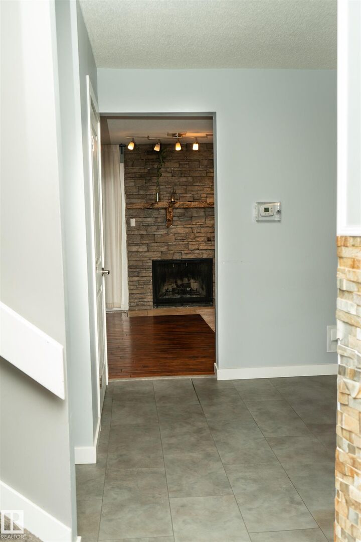 Property Photo:  12070 25 Avenue NW  AB T6J 4L3 