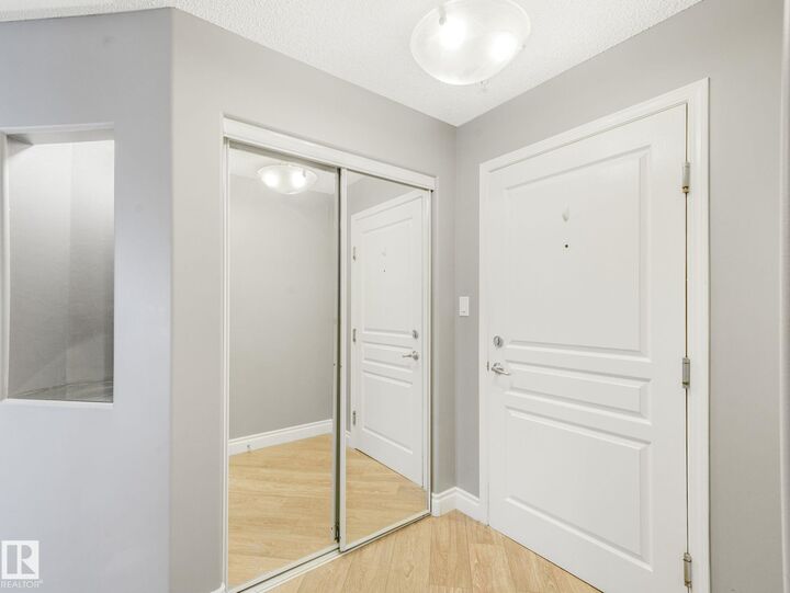 Property Photo: 16035 132 Street NW 332 AB T6V 0B4