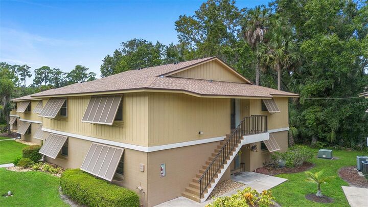 Property Photo:  130 Jasmine Woods Court 4B  FL 32725 
