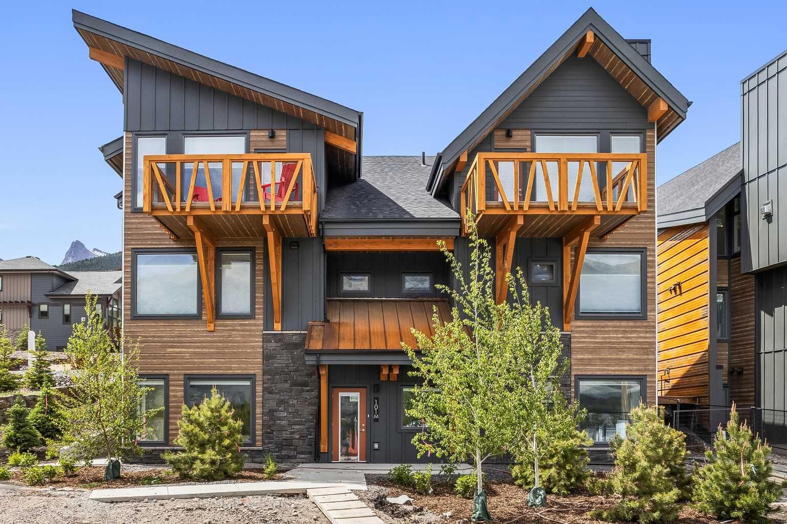 Property Photo: 209 Stewart Creek Rise 202L AB T1W 0N9