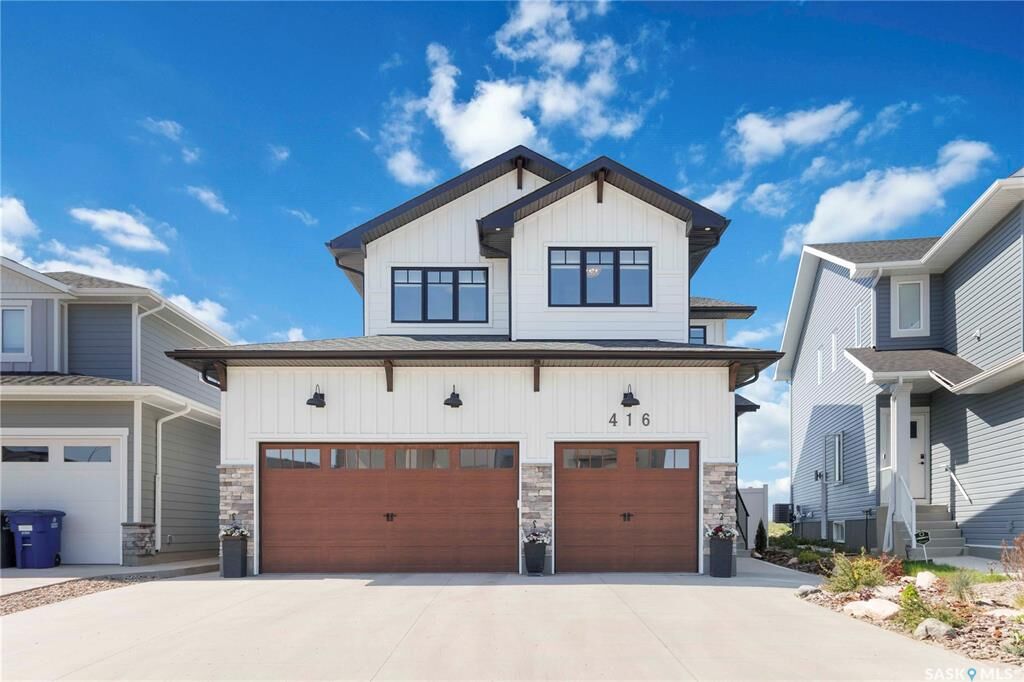 Property Photo:  416 Woolf Bend  SK S7W 1E5 