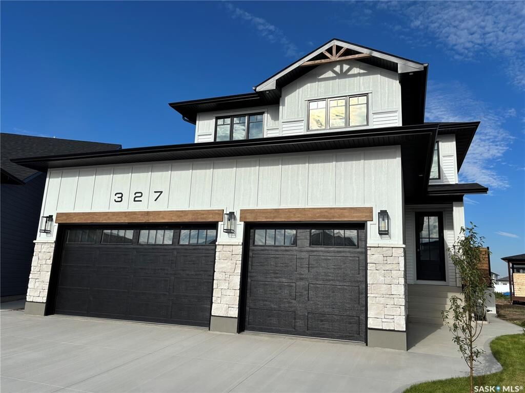 Property Photo:  327 Woolf Bay  SK S7W 1E5 