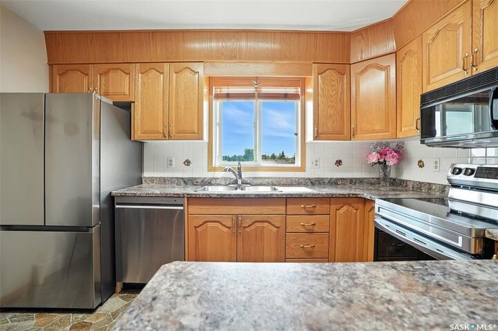 Property Photo:  103 Keevil Crescent 307  SK S7N 4L9 