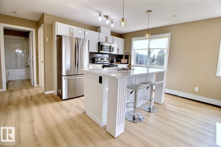 Property Photo: 1196 Hyndman Road NW 266 AB T5A 0P8