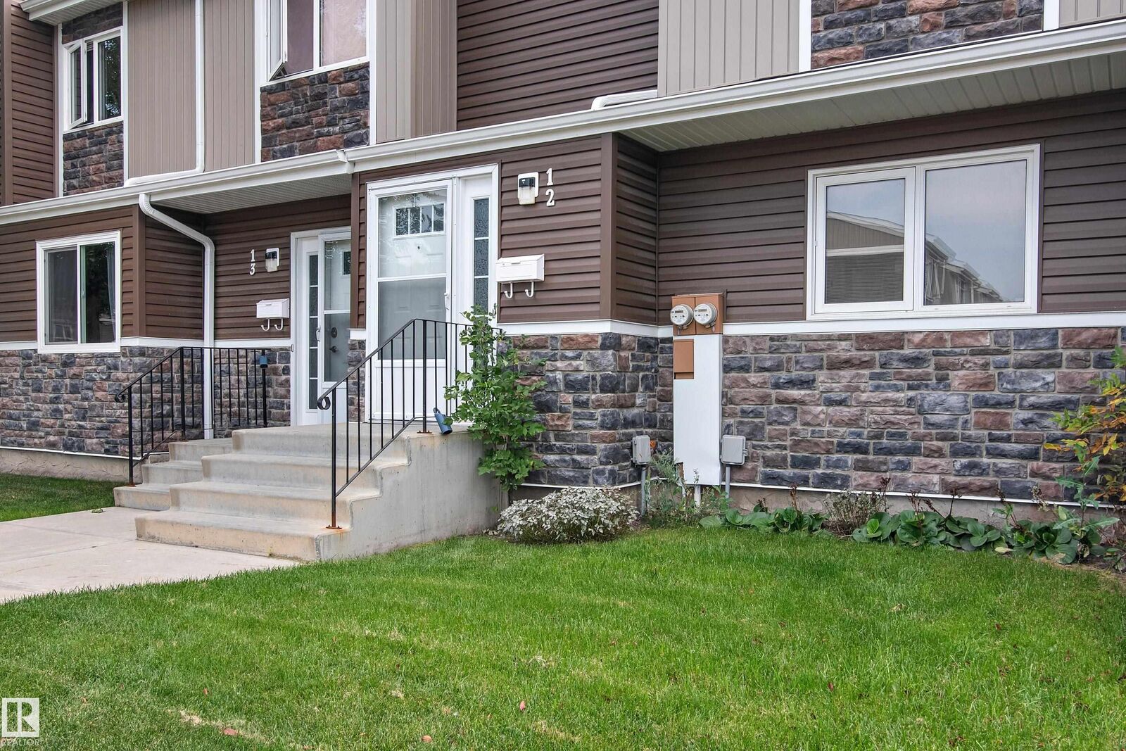 Property Photo: 3115 119 Street NW 12 AB T6J 5N5