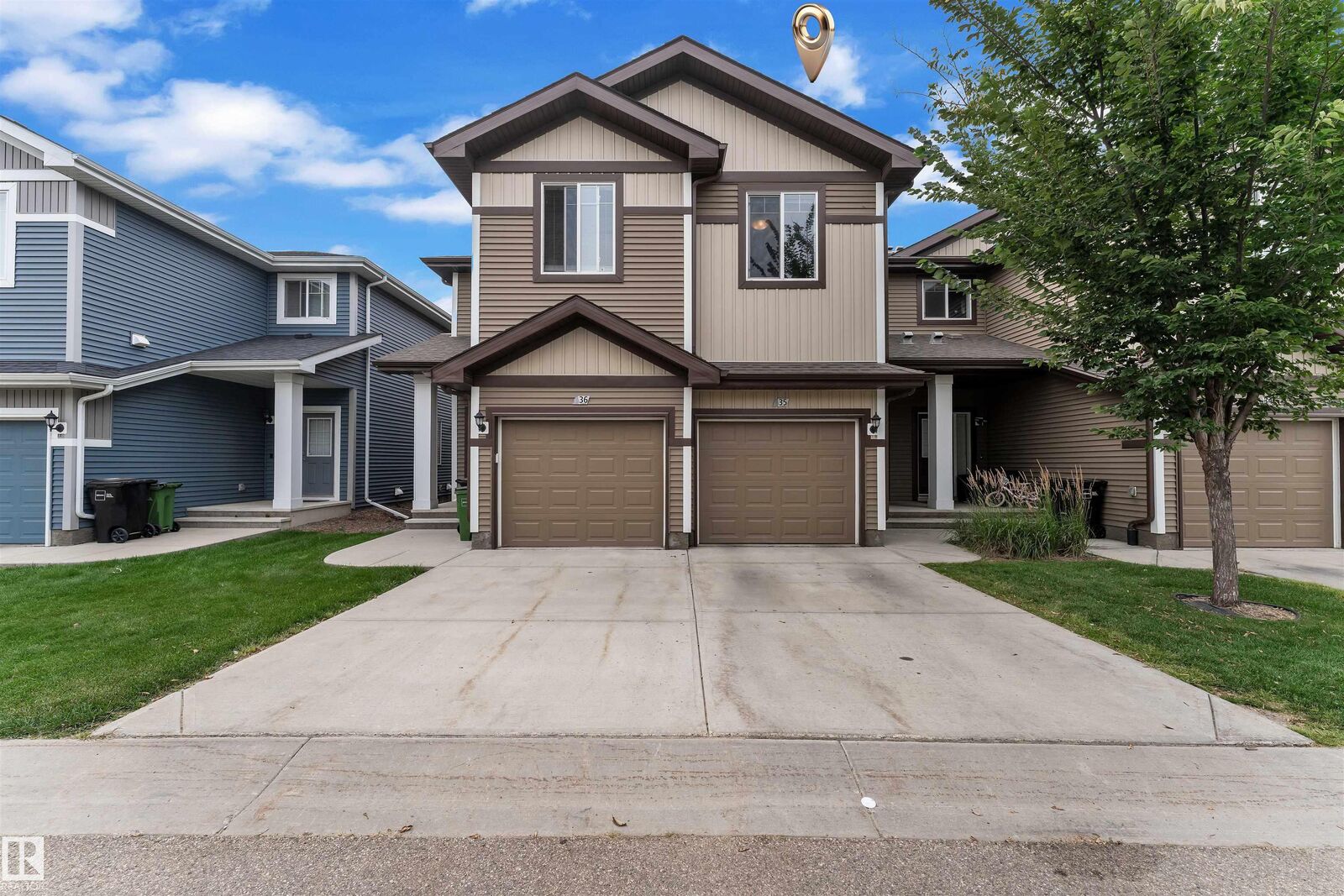 Property Photo: 8209 217 Street NW 35 AB T5T 6Z4