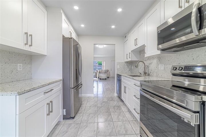Property Photo:  600 NW 80th Ave 105  FL 33063 