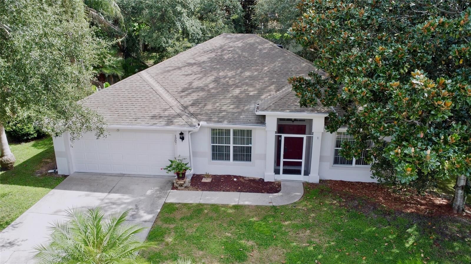 Property Photo:  1307 Rain Forest Lane  FL 34715 