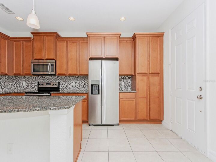 Property Photo:  10070 Eagle Creek Center Boulevard  FL 32832