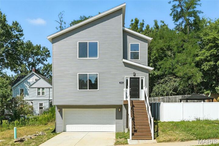 Property Photo:  1623 Forest Avenue  MO 63139 