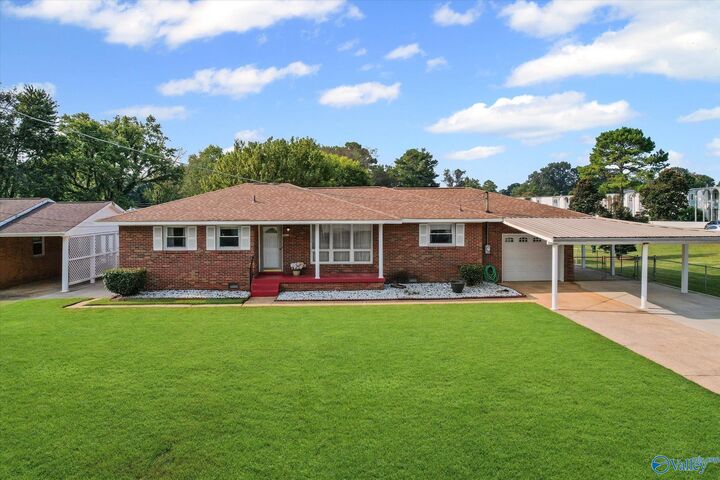 Property Photo: 3811 SW Saturn Drive AL 35805