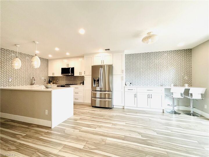 Property Photo:  1455 Curlew Ave 1  FL 34102 