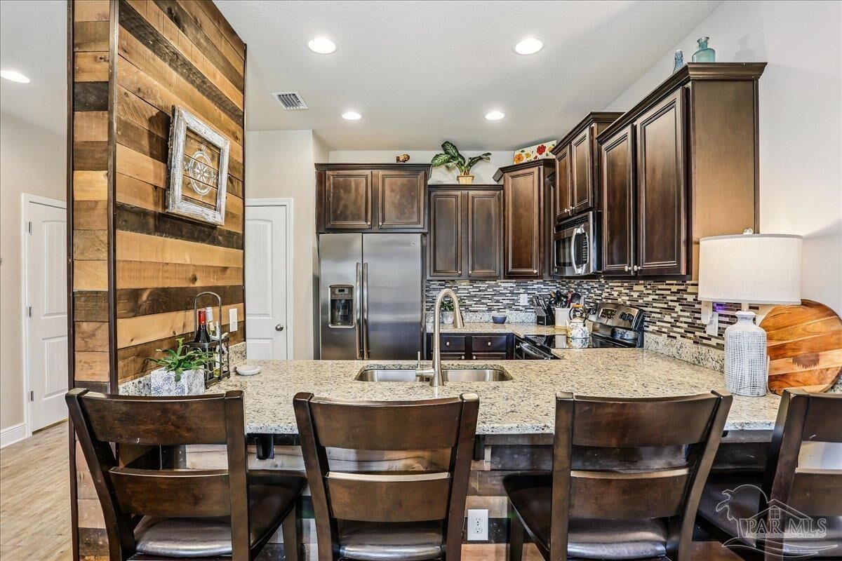 Property Photo:  8881 Brown Pelican Cir  FL 32566 