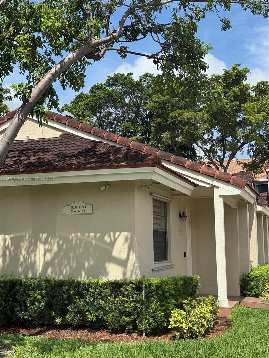 Property Photo: 17230 NW 60th Ct 17230 FL 33015