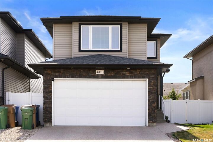Property Photo:  4313 McMillan Drive  SK S4X 0C6 