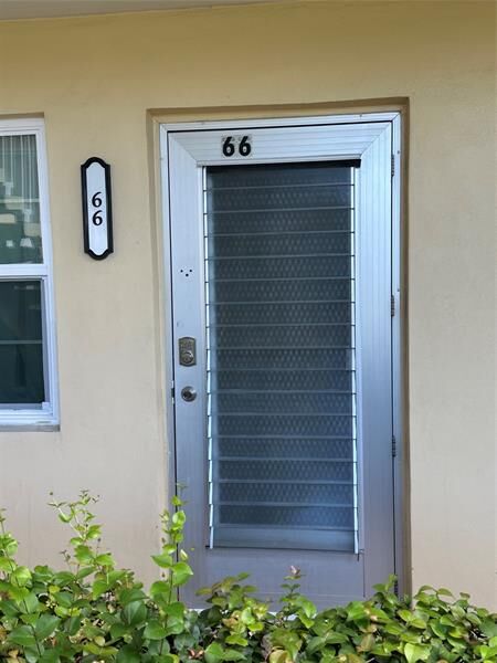 Property Photo:  66 Windsor D  FL 33417 