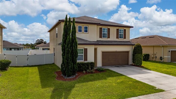 Property Photo: 1663 Gentle Breeze Drive FL 34771