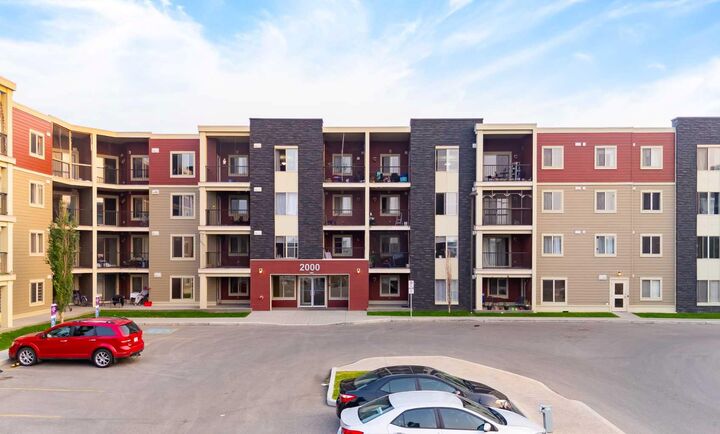 Property Photo: 15 Saddlestone Way NE 102 AB T3J 0S3