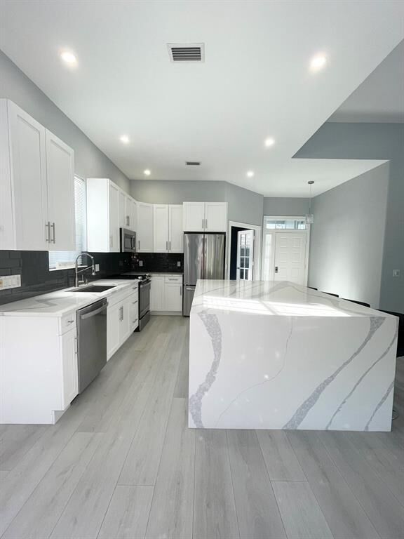 Property Photo: 304 NW Bentley Circle FL 34986