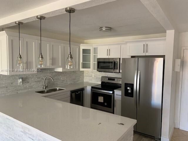 Property Photo: 6990 NW 186th St 4-409 FL 33015
