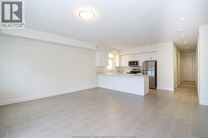 Property Photo: 233 Watson 206 ON N8S 3R8