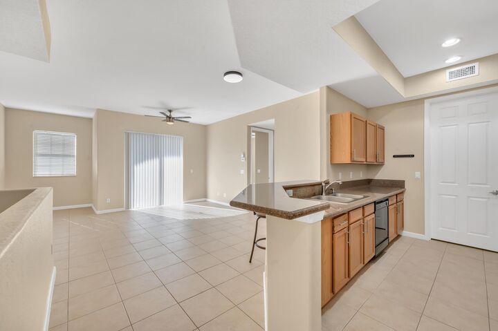 Property Photo:  10280 SW Stephanie Way 8-203  FL 34987 