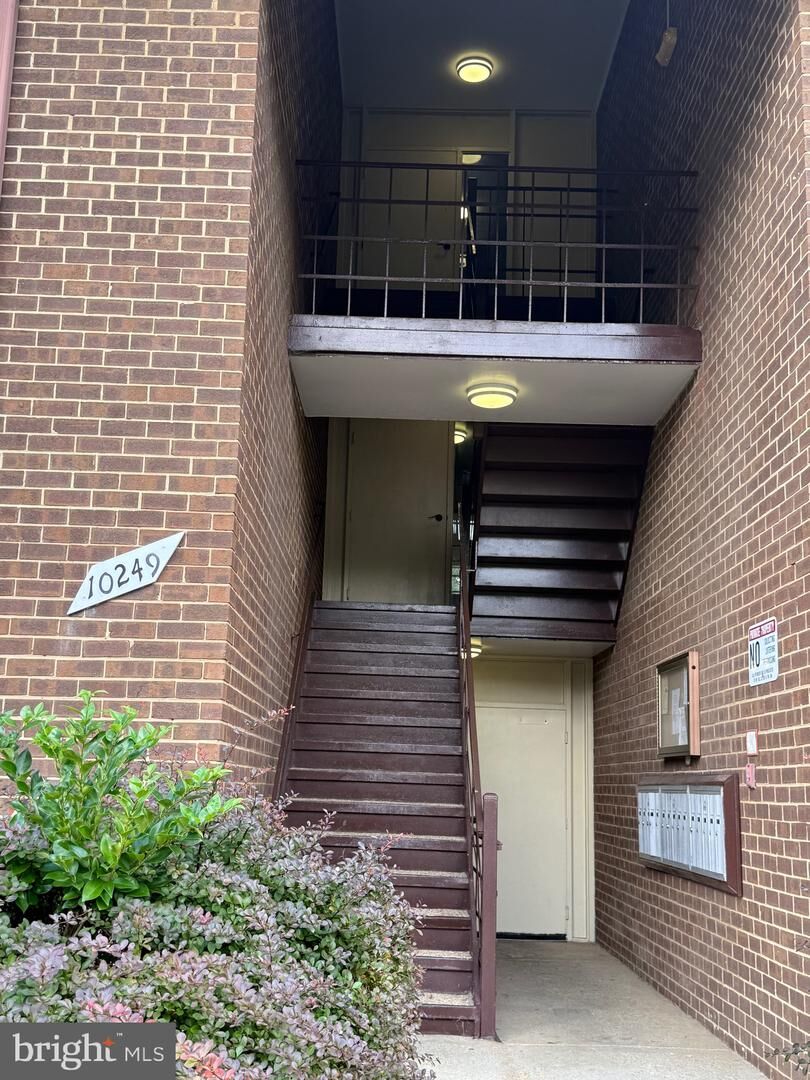 Property Photo:  10249 Prince Place 31-101  MD 20774 