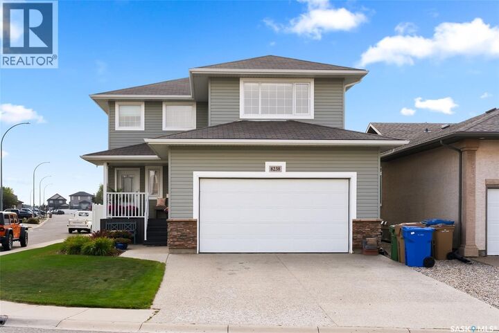 Property Photo:  8238 Fairways West Drive  SK S4Y 0A1 