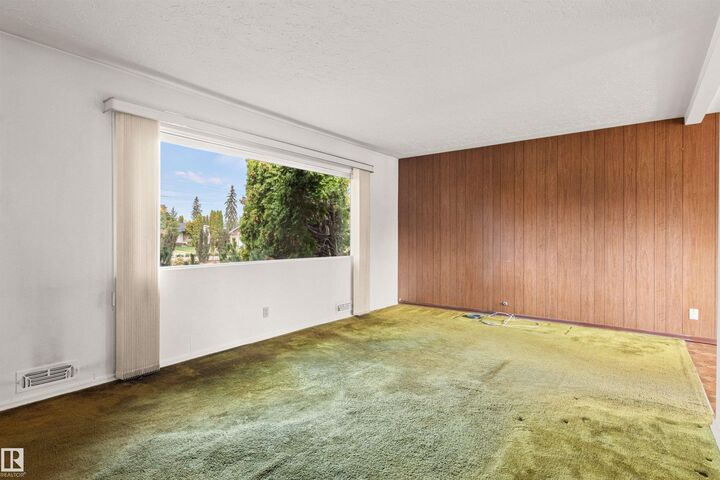 Property Photo:  7131 83 Street NW  AB T6C 2Y1 