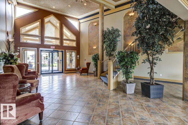 Property Photo:  100 Foxhaven Drive 318  AB T8A 6B6 