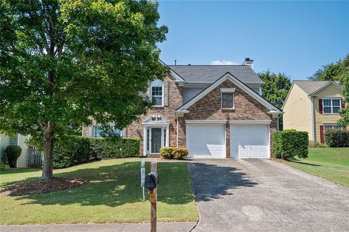 Property Photo:  671 Glenbarrett Court NE  GA 30066 