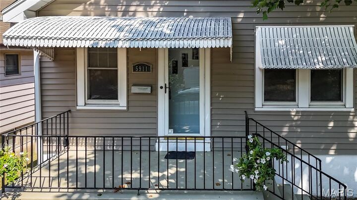 Property Photo:  5911 Scanlan Avenue  MO 63139 