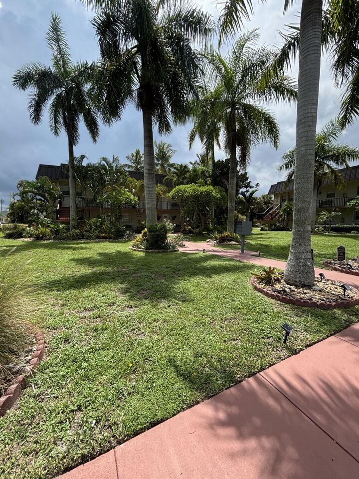 Property Photo:  400 Fern Street 1-C  FL 33458 