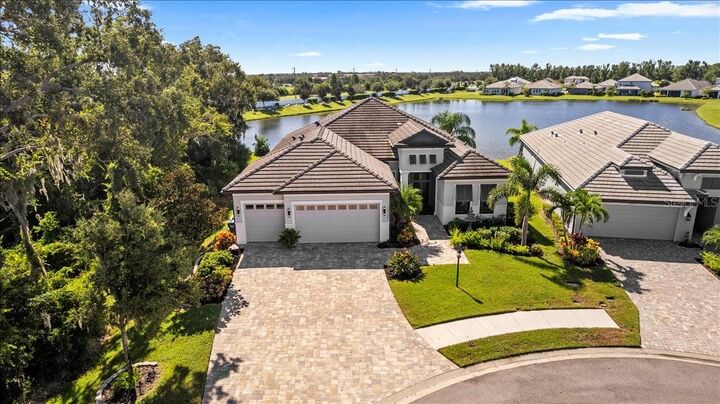 Property Photo:  12131 Bald Cypress Cove  FL 34219 