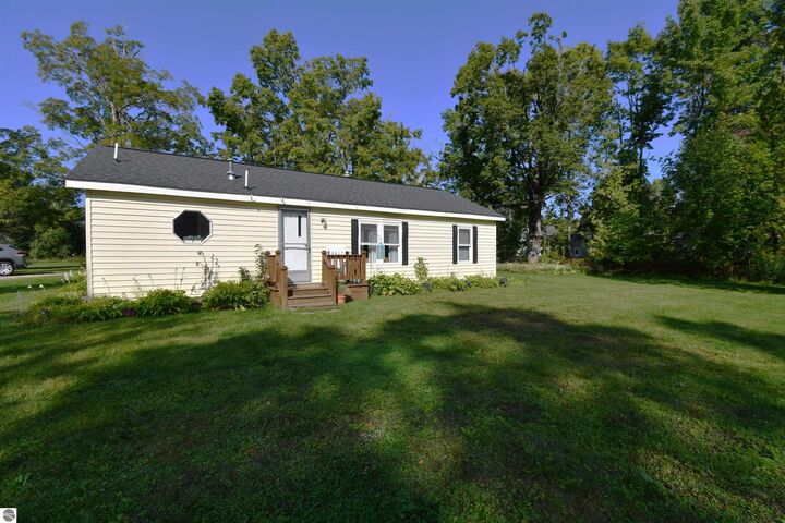 Property Photo:  7714 Lake Street  MI 49706 