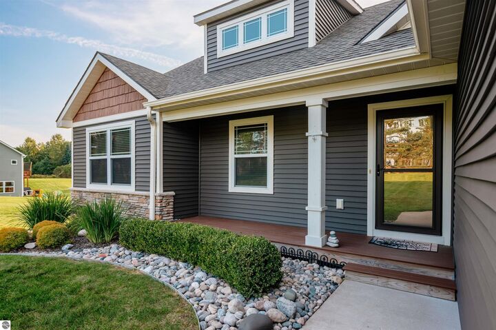 Property Photo:  3877 E Long Lake Road  MI 49685 