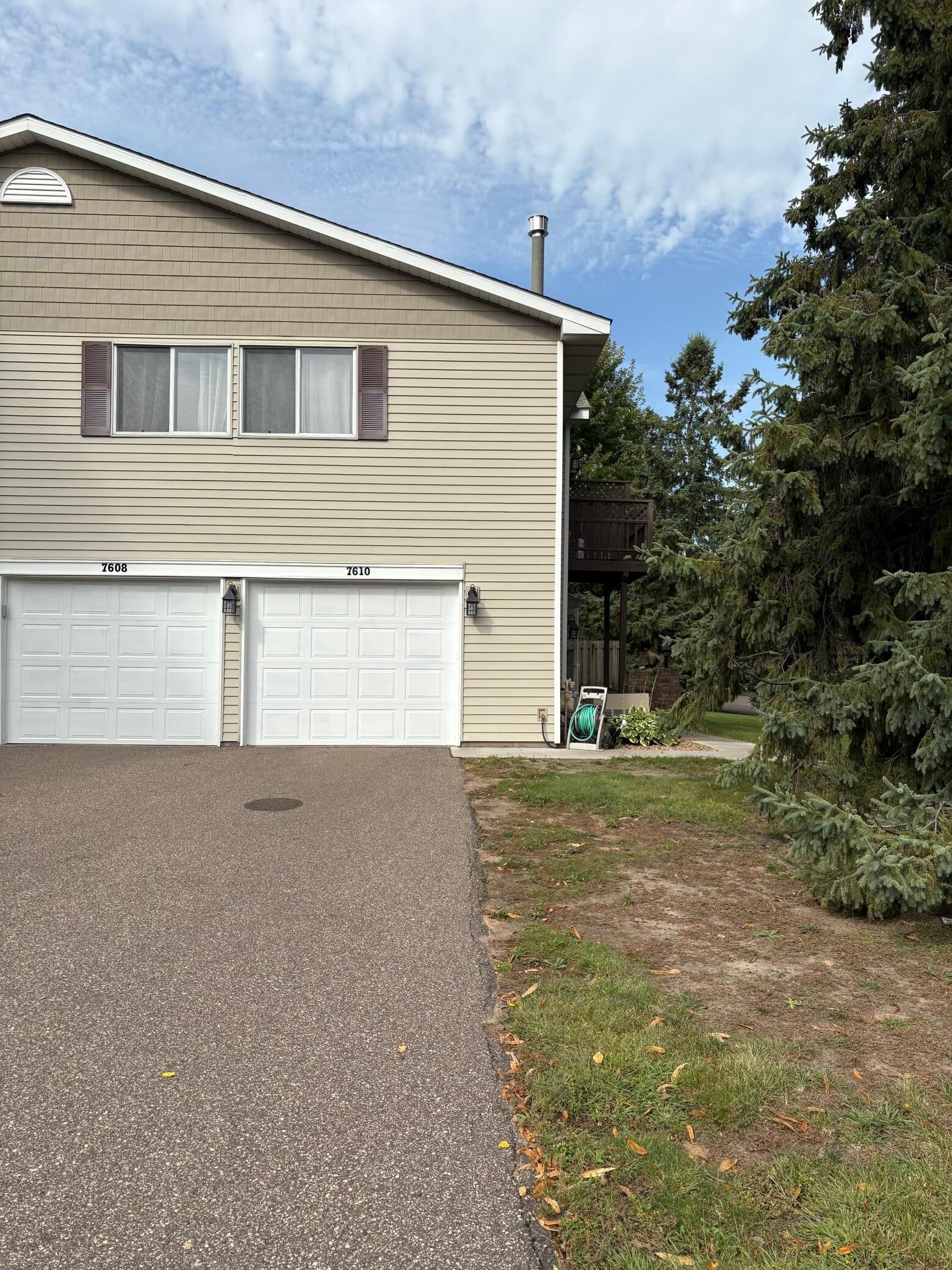 Property Photo:  7610 15th Street Lane N 907  MN 55128 