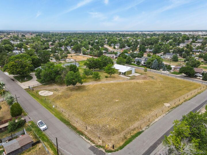 Property Photo: 14821 E 21st Avenue CO 80011