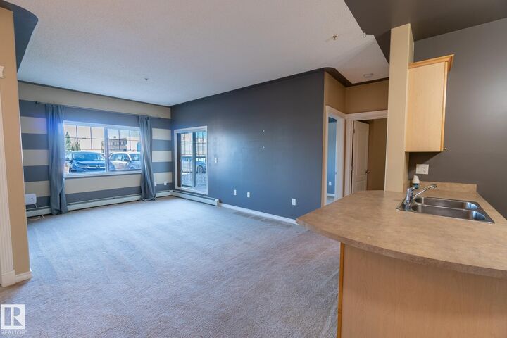 Property Photo:  16807 100 Avenue NW 118  AB T5P 4Z6 