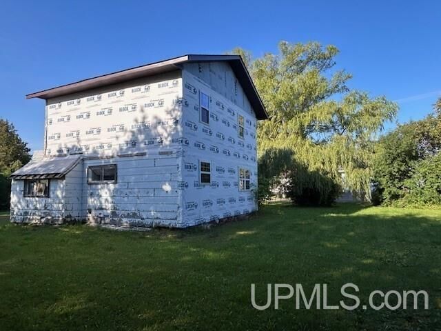 Property Photo:  46882 Naumkeg Street  MI 49905 