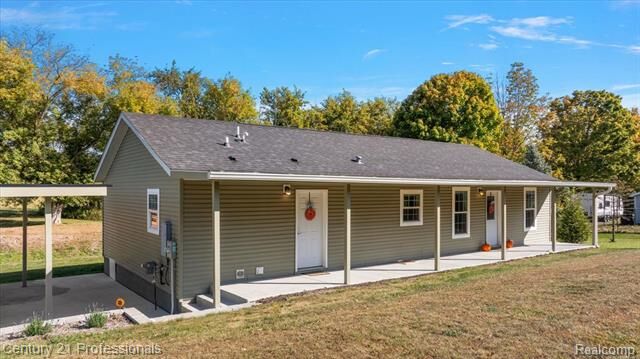Property Photo:  806 Davis Lake Road  MI 48446 