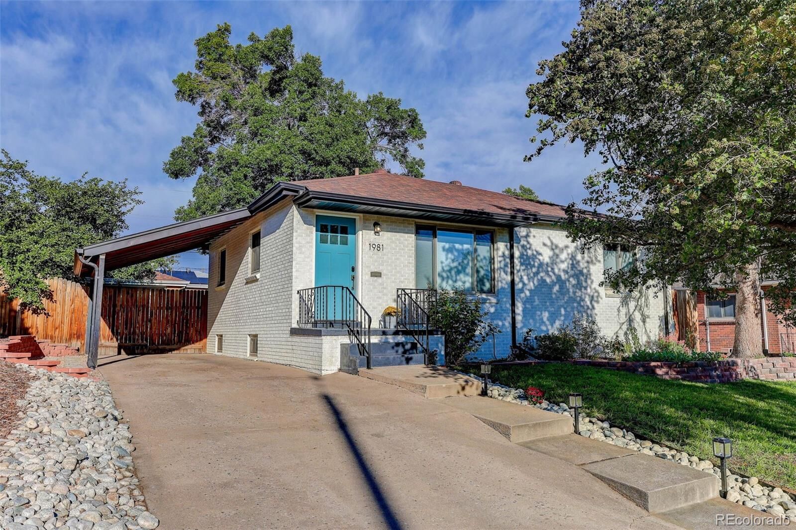Property Photo:  1981 S Wolff Street  CO 80219 