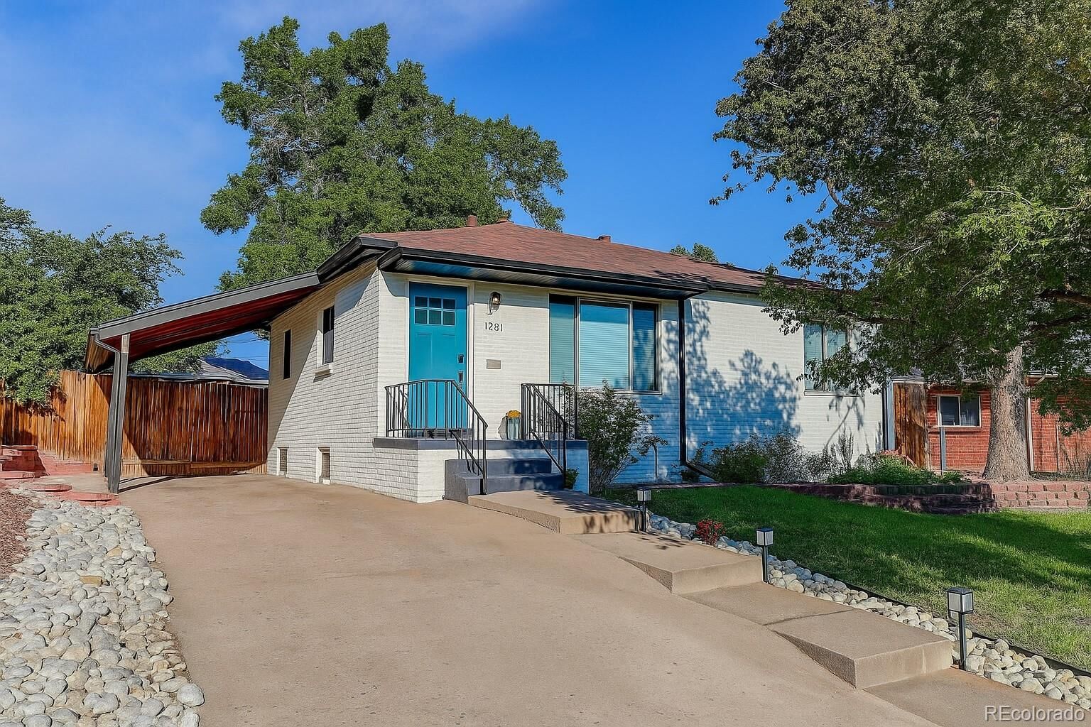 Property Photo:  1981 S Wolff Street  CO 80219 