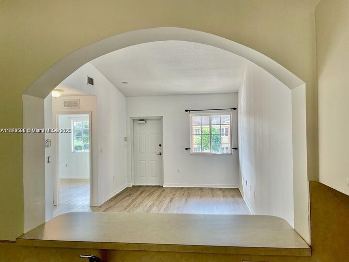 Property Photo:  975 NE 33rd Ter 203  FL 33033 
