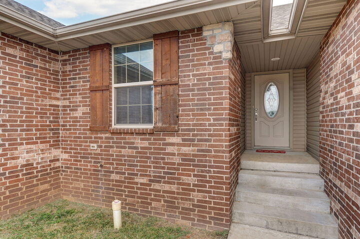 Property Photo:  1433-1435 S Atlas Court  MO 65721 