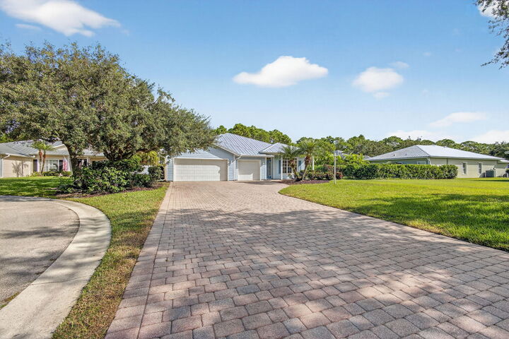 Property Photo:  672 NE Owls Nest Court  FL 34983 