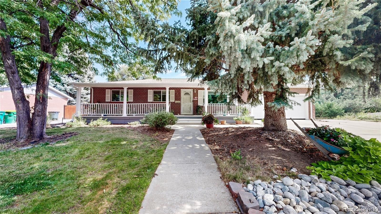 Property Photo:  12276 W Ohio Place  CO 80228 