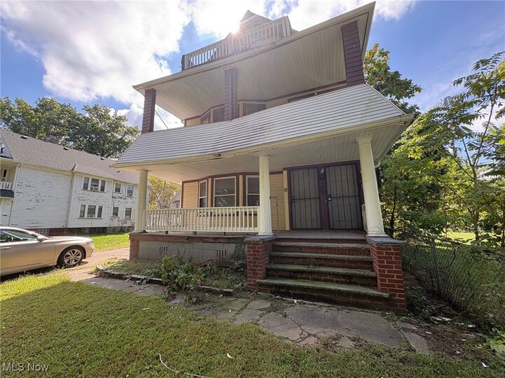 Property Photo:  13802 Rugby Road  OH 44110 